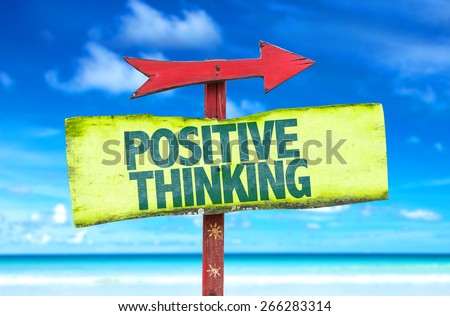 Positive Thinking sign with beach background
