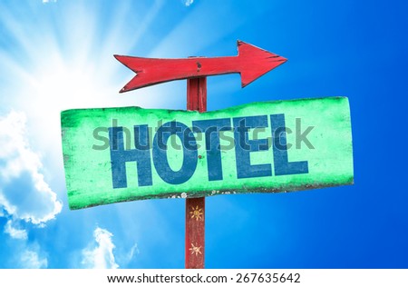 Hotel sign with sky background