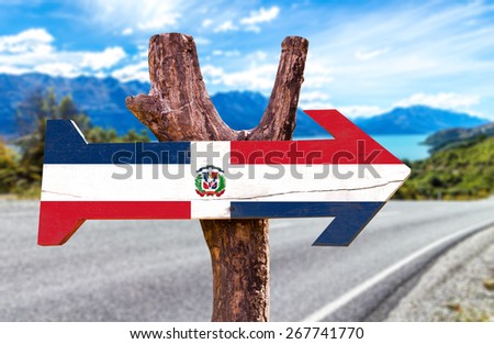 Dominican Republic Flag wooden sign with road background
