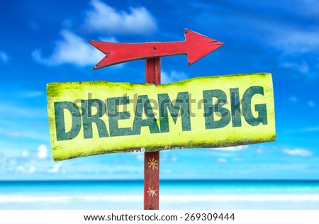 Dream Big sign with beach background