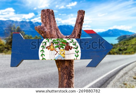 Belize Flag wooden sign with road background