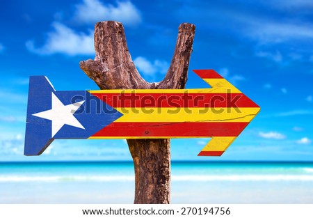Catalonia Flag wooden sign with beach background