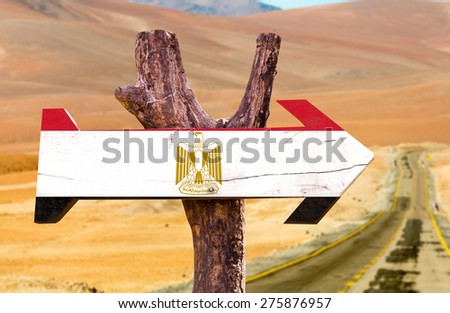 Egypt Flag wooden sign with desert road background