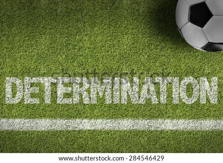 Soccer field with the text: Determination