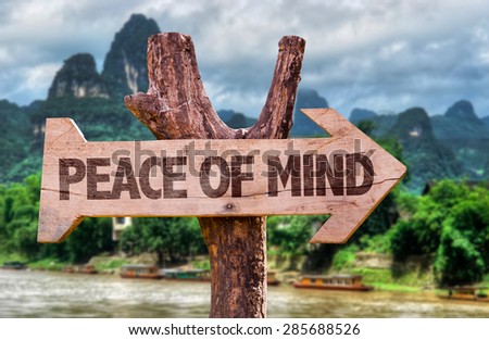 Peace of Mind direction sign with exotic background