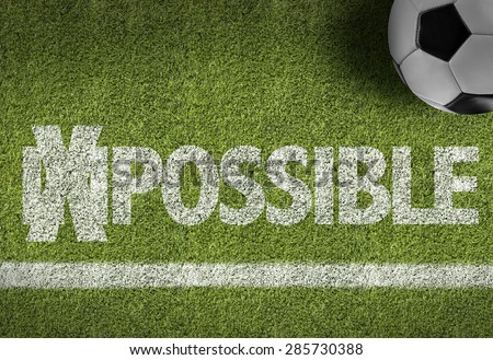 Soccer field with the text: Impossible/Possible