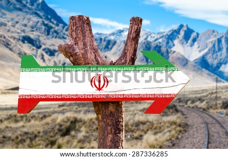 Iran Flag wooden sign with desert road background