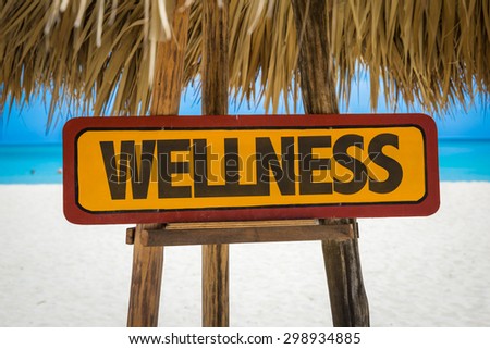 Wellness sign with beach background
