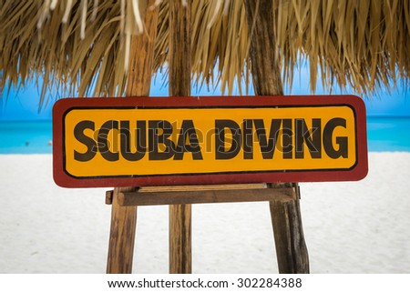 Scuba Diving sign with beach background