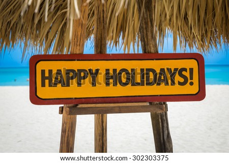 Happy Holidays sign with beach background