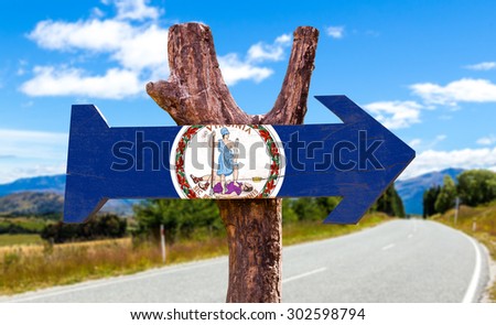 Virginia Flag wooden sign with agriculture landscape on background