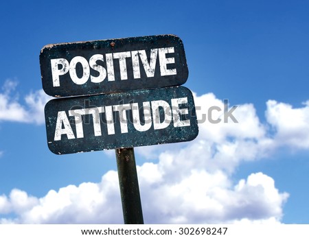 Positive Attitude sign with clouds on background