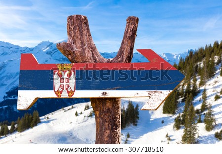 Serbia Flag wooden sign with winter background