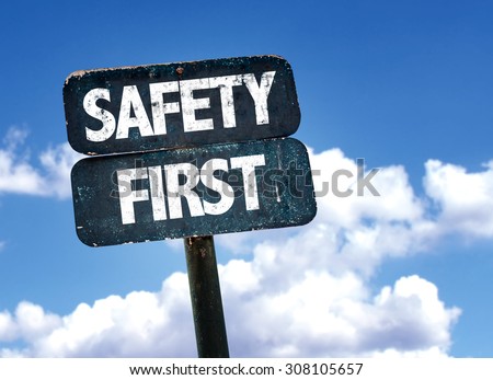 Safety First sign with sky background