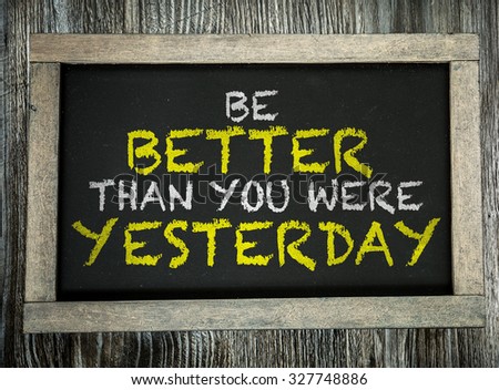 Be Better Than You Were Yesterday written on chalkboard