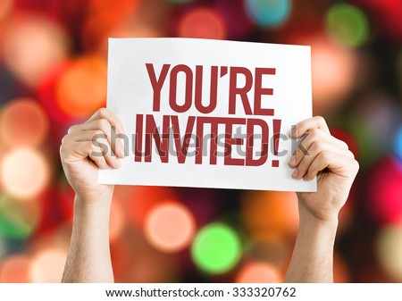 You\'re Invited! placard with bokeh background
