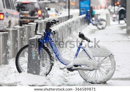 NEW YORK, NY - JAN 3: Citibike covered with snow in New York, January 3, 2014