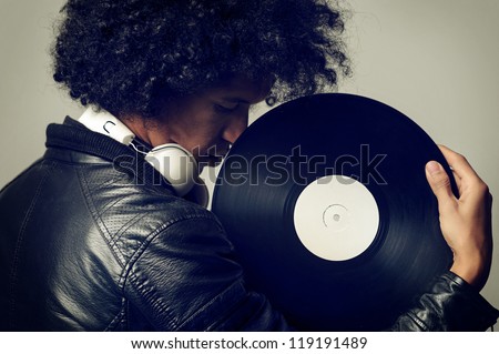 retro music dj portrait with old vinyl record