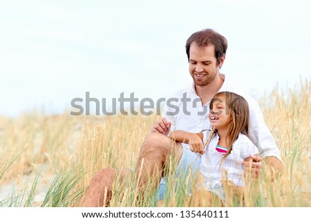 adorable father and daughter have fun together happy healthy lifestyle smiles