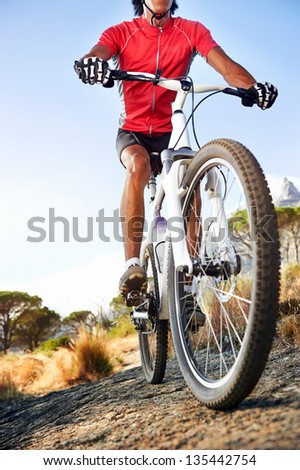 Extreme mountain bike sport athlete man riding outdoors lifestyle trail