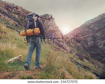 Adventure Man Hiking Wilderness Mountain With Backpack, Outdoor Lifestyle Survival Vacation