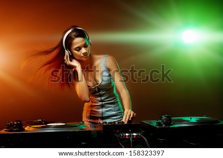 Real Woman Dj Playing Music At Party