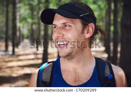 happy fit healthy trail runner man