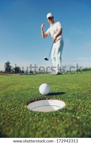 Golf Man Putting On Green For Birdie While On Vacation