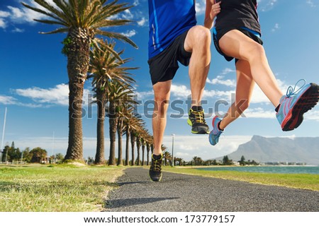 running couple jump with speed and fitness sprint race