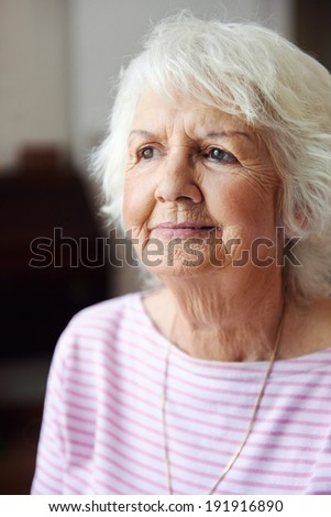 Portrait of an old woman deep in thought