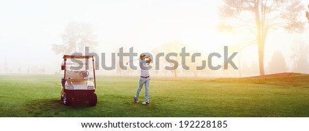 Beautiful early morning golf game at the course in the sunrise and panoramic view Beautiful early morning golf game at the course in the sunrise and panoramic view