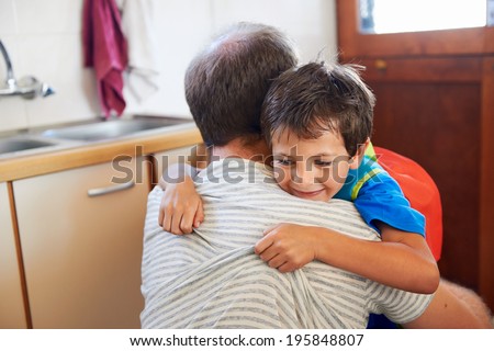father and son hug goodbye before school love and affectionate embrace