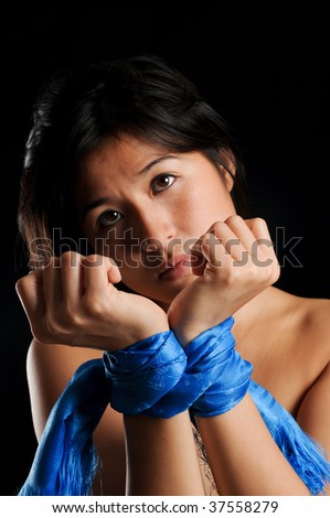 stock photo Asian girl tied up against her will