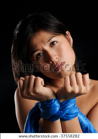 stock photo Asian girl tied up against her will