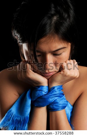 stock photo Asian girl tied up against her will