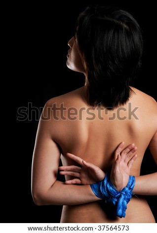 stock photo Asian girl is tied up with blue material