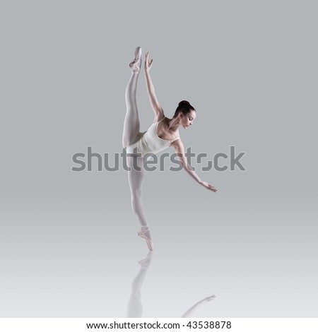 Professional ballet dancer isolated in studio