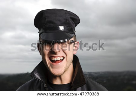 Happy police man laughs out loud