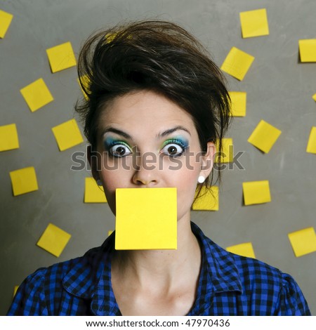Pretty fashion model with hundreds of post it notes
