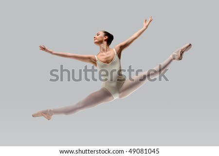 Professional female ballet dancer isolated in studio
