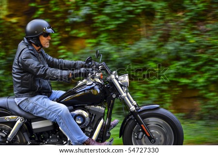 Man enjoys his Sunday afternoon ride on his motorbike