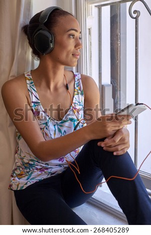 content young woman relaxing with headphones listening music