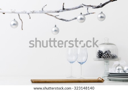 Christmas decoration table display in silver frosty icy tone, simple minimalist elegant design