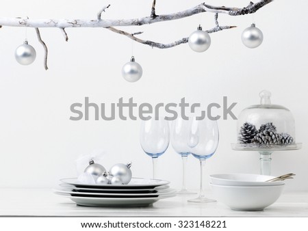Christmas decoration table display in silver frosty icy tone, simple minimalist elegant design
