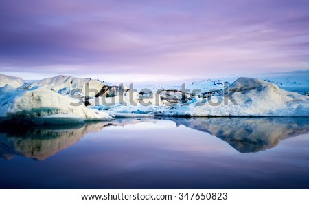 Jokulsarlon glacier Lagoon with floating icebergs and reflection in southeast iceland, a famous natural tourist attraction