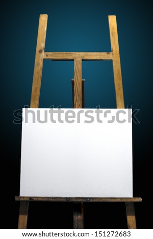 Cloth white wooden easel painting placing, under the deep blue background.
