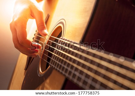 Woman\'S Hands Playing Acoustic Guitar, Close Up