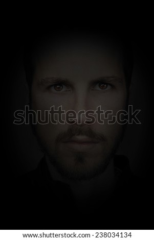dark portrait of a young beautiful man