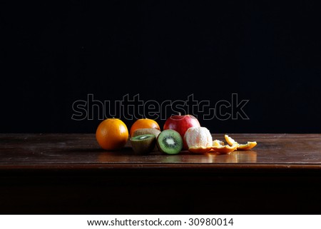 composition of fruits on black background