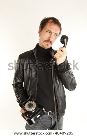 angry young man at the telephone